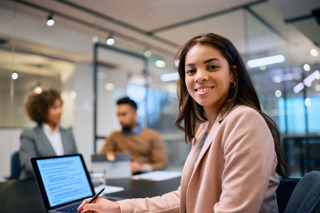 African American woman working in the office on content creation